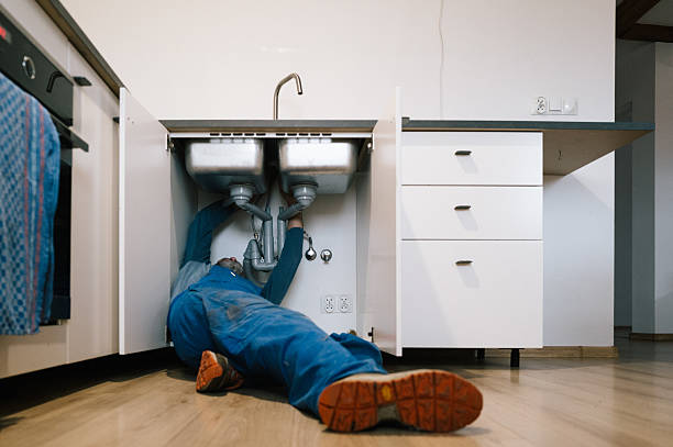 Professional Drain Cleaning technician working in Nashville, AR
